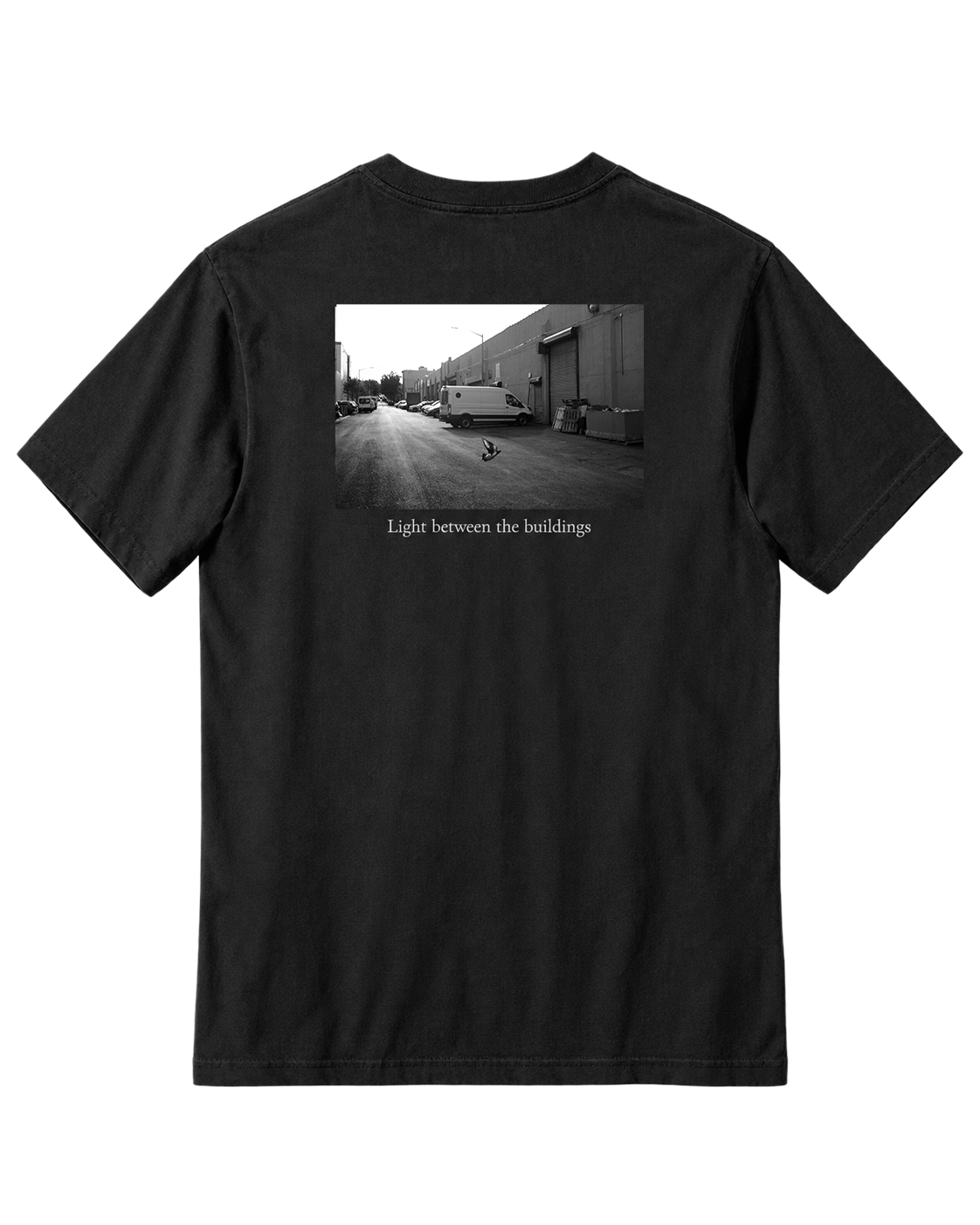 The Light Between the Buildings Black Carhartt pocket tee back